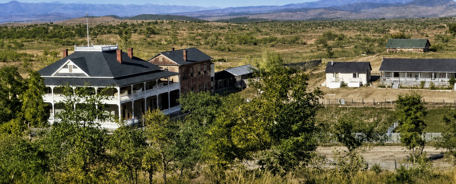 The Mountain View Hotel in its prime, set among its outbuildings in the high desert of Oracle, Arizona